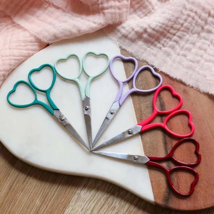 Heart shaped embroidery scissors in green purple and red