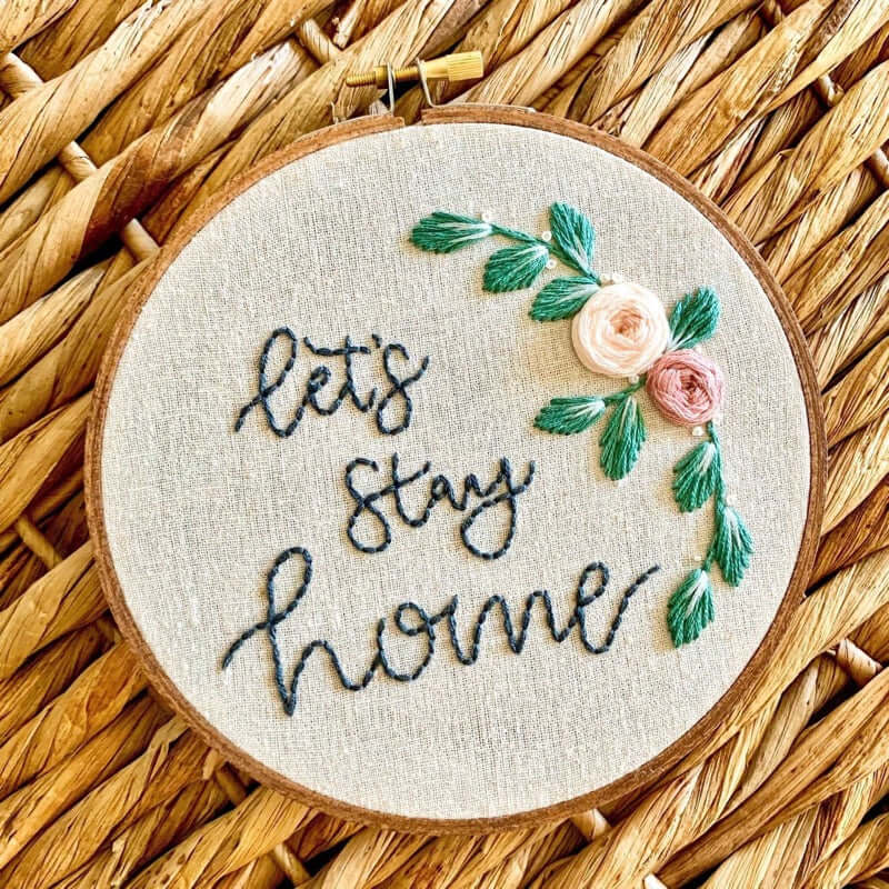 A Let's Stay Home embroidery hoop design